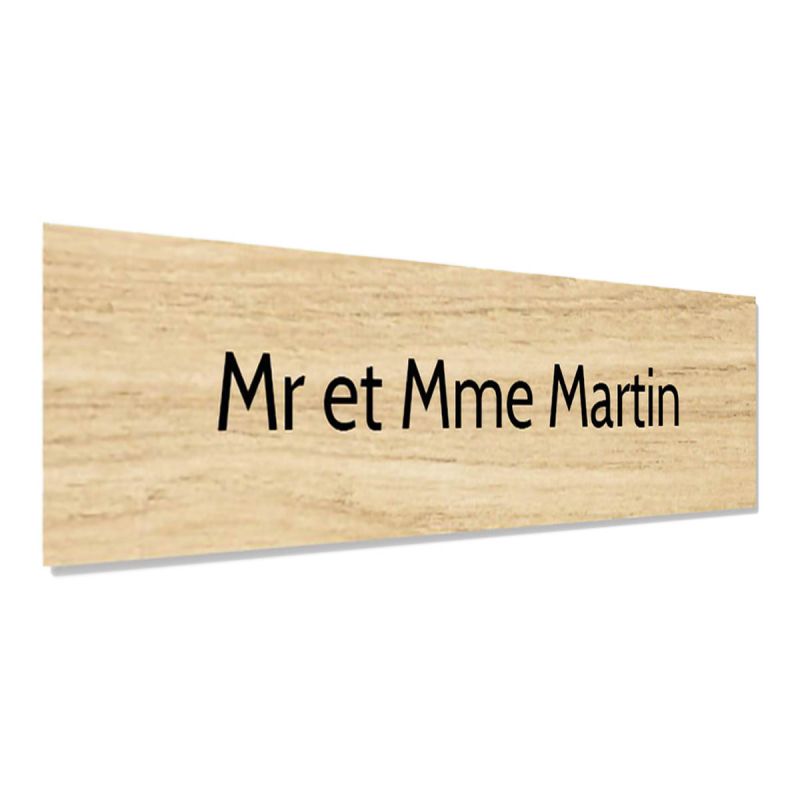 Plaque adhésive interphone personnalisée gravure laser - plastique bi-couche effet bois clair lettres noires - 60x15 mm épaisseu Plaque adhésive interphone personnalisée gravure laser - plastique bi-couche effet bois clair lettres noires - 60x15 mm épaisseu