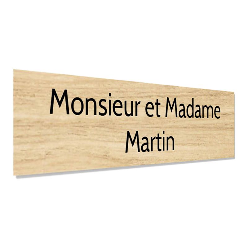 Plaque adhésive interphone personnalisée - Étiquette plastique bi-couche effet bois clair - Gravure laser noire, 60x15 mm, épais Plaque adhésive interphone personnalisée - Étiquette plastique bi-couche effet bois clair - Gravure laser noire, 60x15 mm, épais