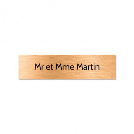 Plaque adhésive interphone ou sonnette 60 mm x 15 mm gravure personnalisée sur 1 ligne couleur cuivre lettres noires