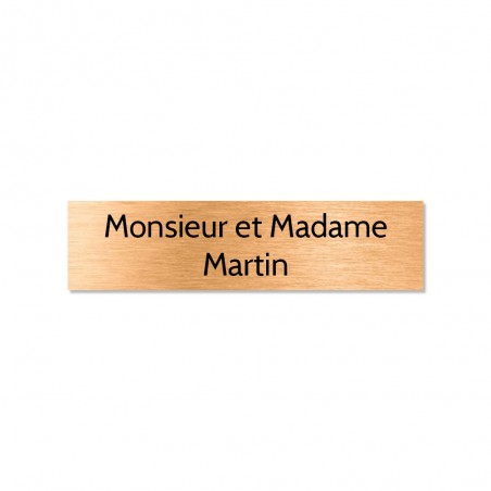 Plaque adhésive interphone ou sonnette 60 mm x 15 mm gravure personnalisée sur 2 lignes couleur cuivre lettres noires